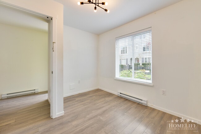 Building Photo - Spacious 4 Bedroom 4 Bathroom Townhome at King’s Landing with Double Garage Balcony and Yard Space
