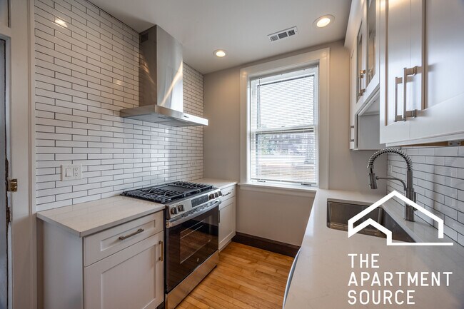 Building Photo - 6411 N Talman Ave