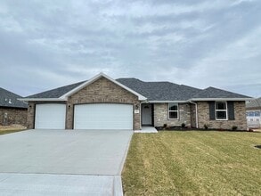 Building Photo - 6002 S Iris Ln