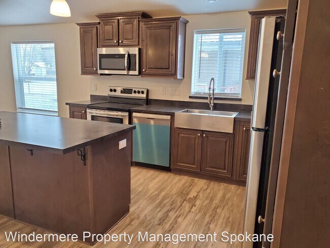 Foto del edificio - 3 br, 3 bath House - 6713 E 7th Ave