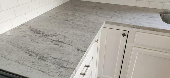 Kitchen Counter, hand selected stone called "Super White" - 11218 N Nashua Dr