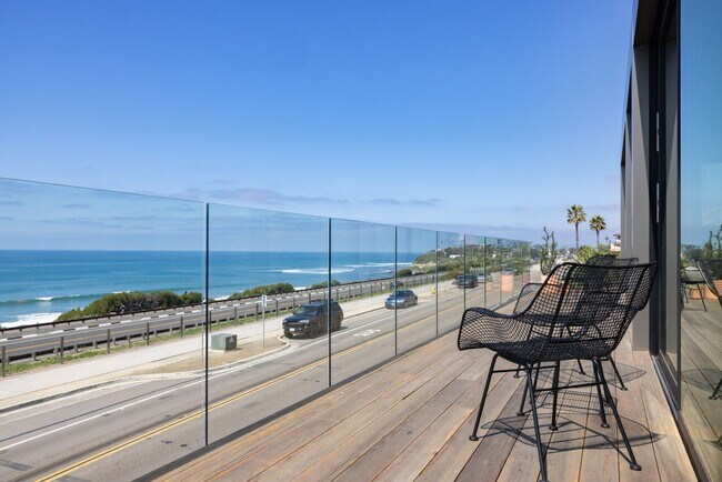 Building Photo - Fully Furnished, Modern Coastal Luxury wit...