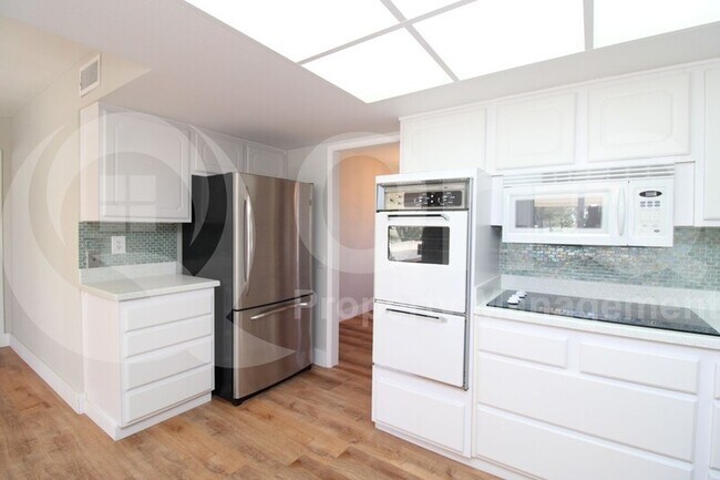 Foto del edificio - 9547 W Country Club Dr