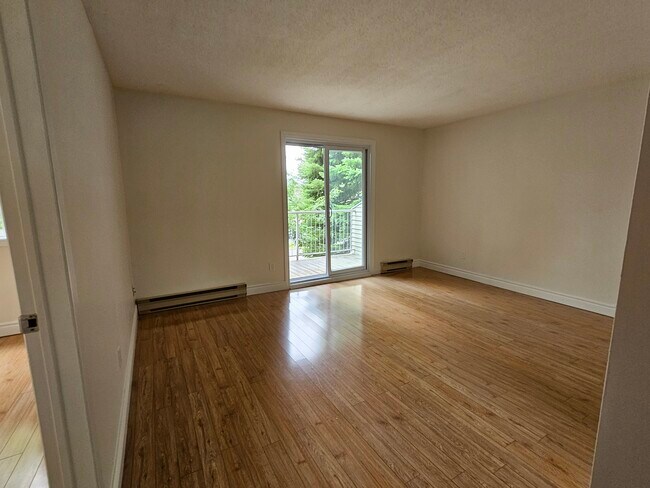 Photo du bâtiment - Home for Rent | 103 Rue des Amandiers