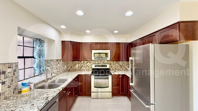 Building Photo - 5704 E Aire Libre Ave