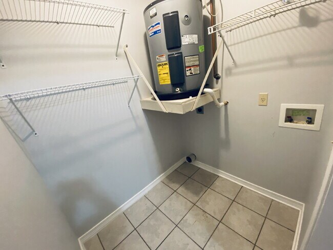Building Photo - Fantastic location! This end unit offers t...