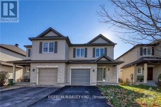 Building Photo - 311 Riversedge Crescent