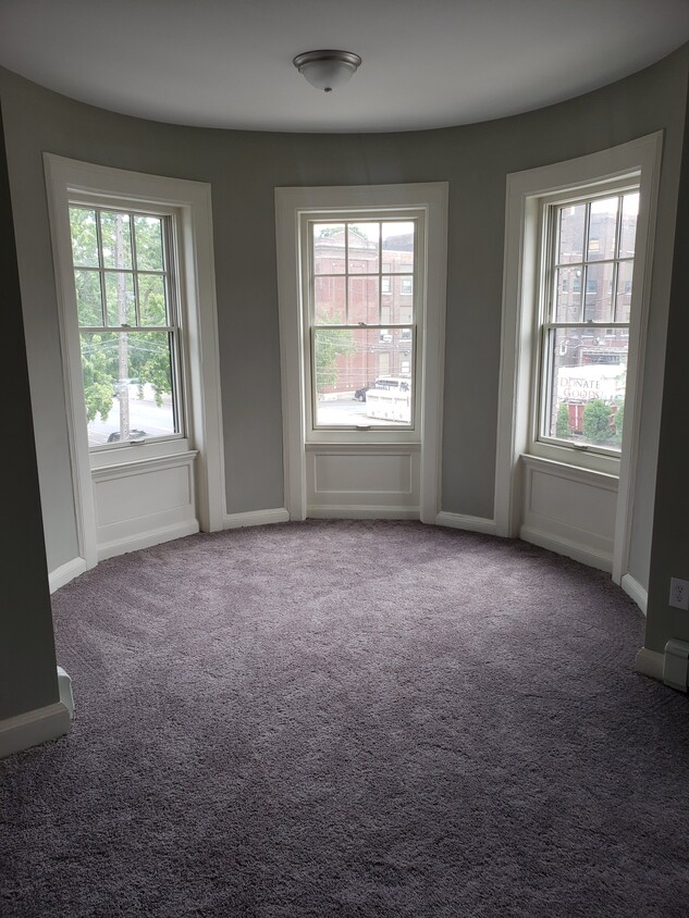 Large master bedroom, measures approx. 20 ft by 20 ft. Bedroom has four windows. - 2 Judson St