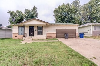 Building Photo - 4824 N Xanthus Ave