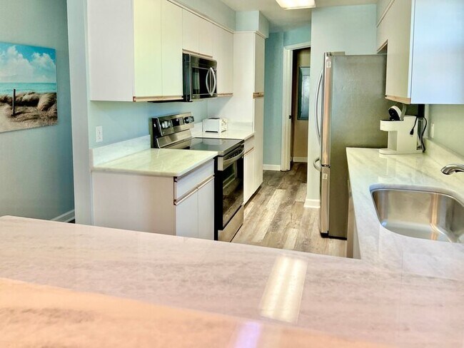 Building Photo - Palms 205 - Paradise Palms