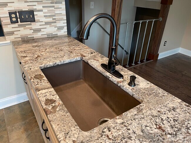 Granite Countertops and Tile Backsplash - 7012 Avery Rd