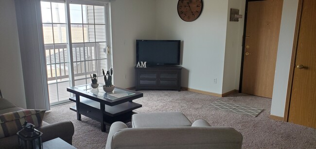 2 bedroom Living Room - Sycamore Apartments