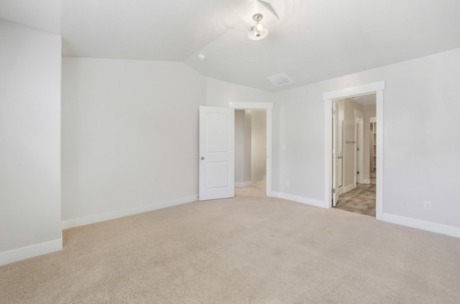 Building Photo - Pet Friendly 4-Bedroom End-Unit Townhome