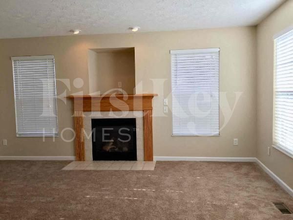 Foto del edificio - 7568 Sycamore Woods Ln