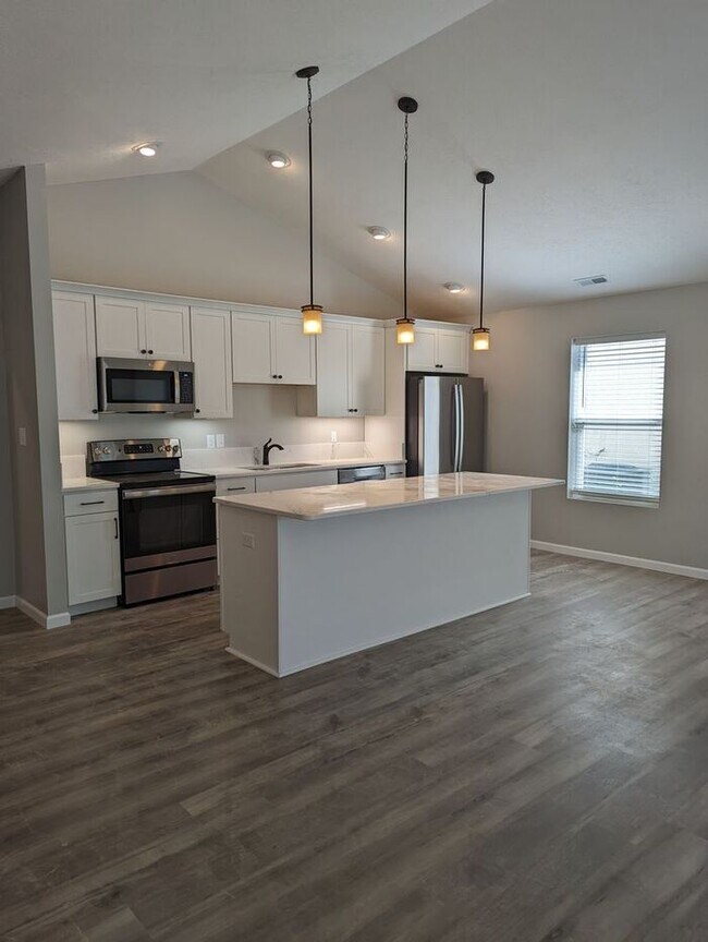 Foto del edificio - 4 Bedroom Home With An Open Floor Plan In ...