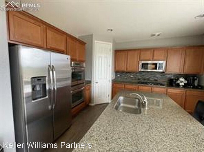 Building Photo - 4 br, 3 bath House - 7114 Laurel Cherry Ct