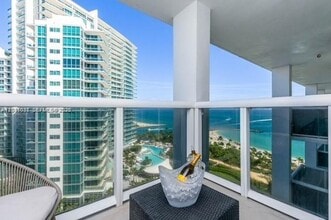 Building Photo - 10275 Collins Ave