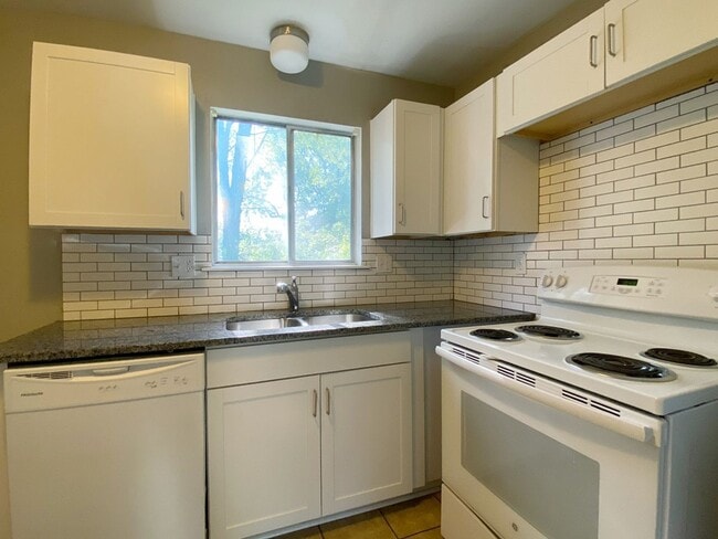 Building Photo - Corner Lot Charmer with 2-Car Garage in Ov...