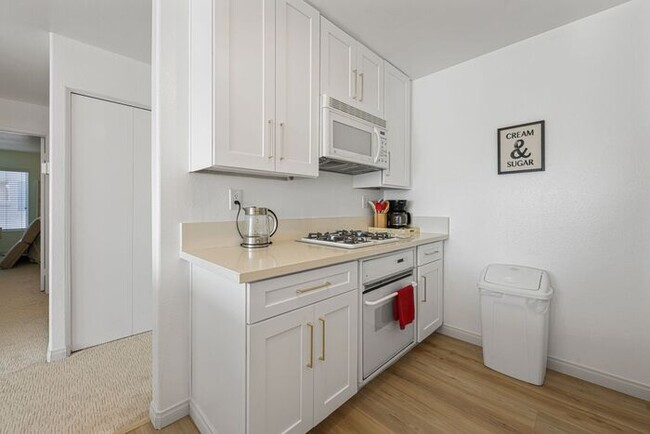 Building Photo - Thoughtfully Remodeled Condo W/ Attached G...