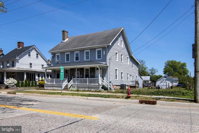 Building Photo - 330-332-332 E Broadway
