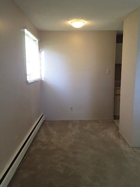 Photo du bâtiment - Cozy 1-Bedroom Apartment – Great Location & All Utilities Included
