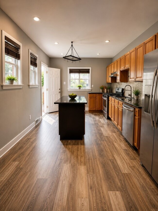 Building Photo - Spacious 3-Bedroom, 1.5-Bath South Philadelphia Townhome with Private Yard and Pets Allowed