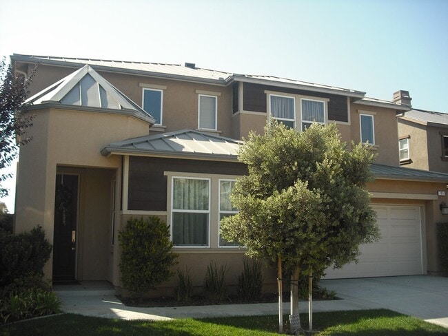 Building Photo - Move near the Beach into this spacious 5 b...