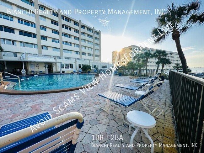 Building Photo - Updated Condo with Stunning Water Views! -...