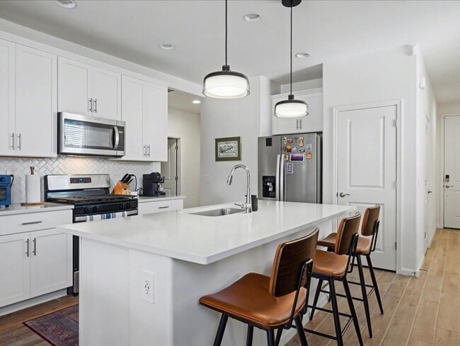 Building Photo - Spacious 4-Bedroom Home with Modern Features & EV Charging!