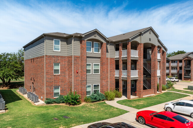 Building Photo - The Greens at Mustang Creek