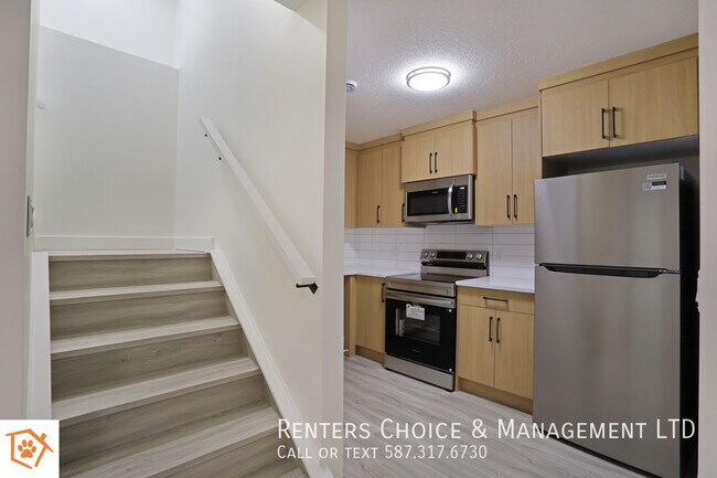Photo du bâtiment - Brand New 2 Bedroom Pet Friendly Basement Suite