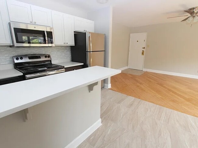 The Bentley - Renovated Kitchen - Apartments on Fifth