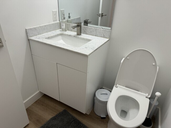 Building Photo - Furnished with Modern Class!