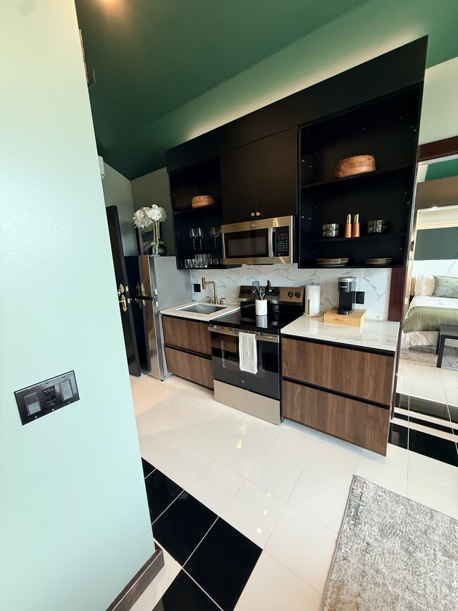Extended Stay Executive Suite Kitchen - Villas on Turtle Creek