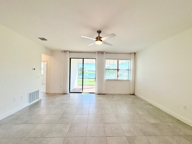 Building Photo - Lovely 4/2 at Harmony Enclave a Golf Cours...