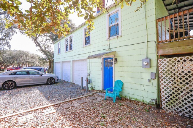 Building Photo - Stunning upstairs unit just one block from...