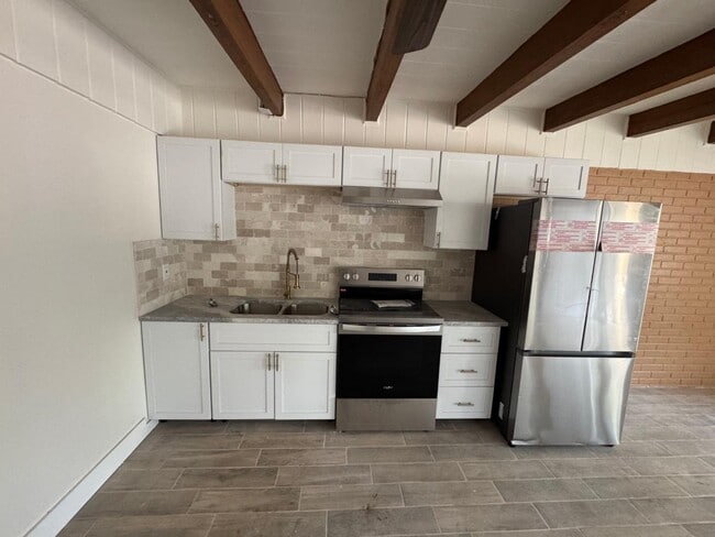 Building Photo - 1216 E 138th Ave