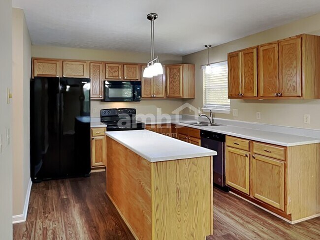 Foto del edificio - 8676 Woolstone Ct