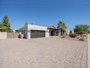 Building Photo - 7466 E Windrose Dr