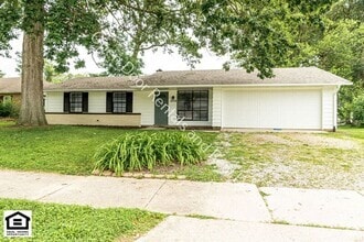 Building Photo - 6718 Raintree Rd
