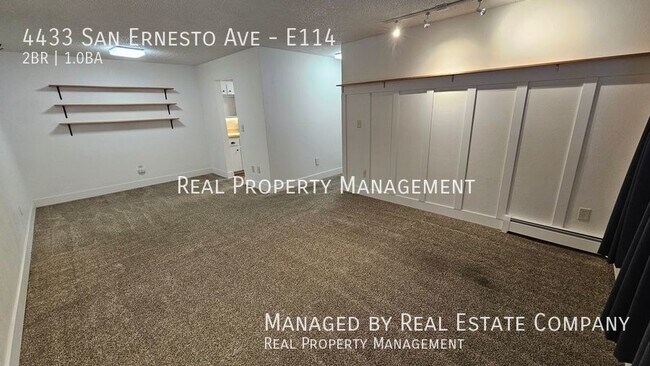 Building Photo - Two Bedroom Condo w/ Carport and Secure Entry