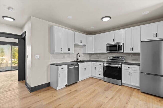 Building Photo - For Rent: Renovated 2-Story Townhouse in M...