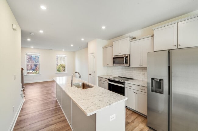 Building Photo - Luxury Meets Convenience: 2-Bed, 2.5-Bath Townhome in Scenic Neighborhood