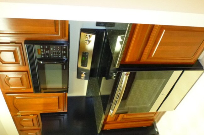 Kitchen- New applicances/ granite countertops - 415 S Howes St