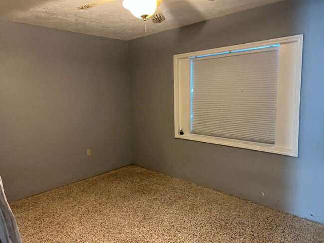 Building Photo - Charming 2-Bed Waterfront Retreat with Ter...
