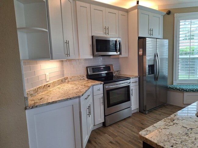 Building Photo - 3BR 2BA BOUCHELLE ISLAND GROUND FLOOR COND...