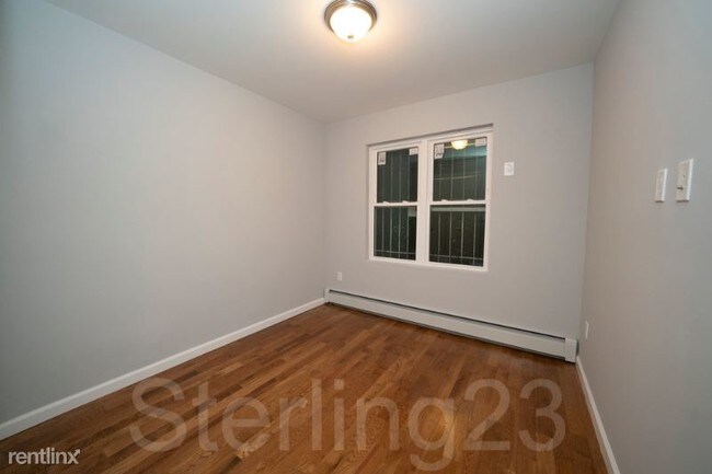 Building Photo - 49-17 21st Ave