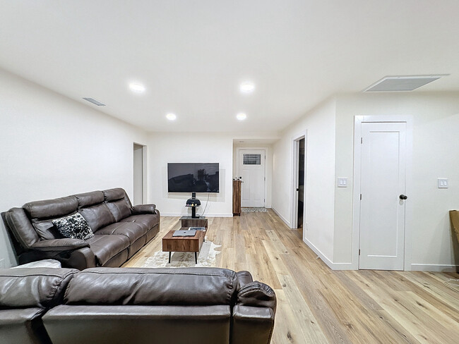 Building Photo - 6449 Woodlake Ave