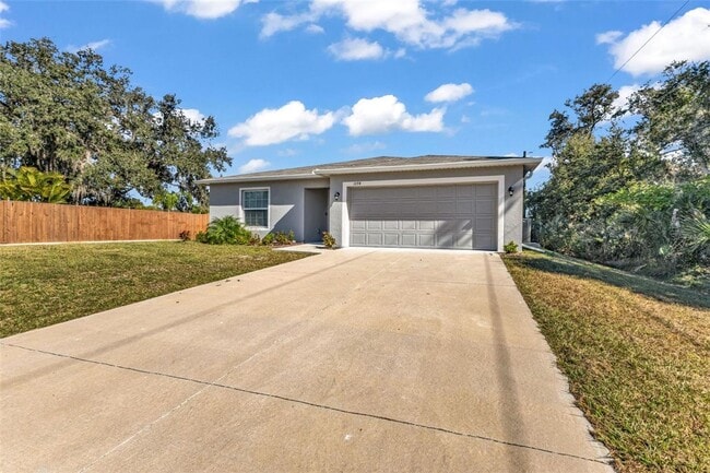 Building Photo - 3/2 FL dream home w/ large backyard & stylish new construction feel!!