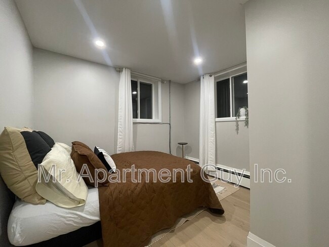 Building Photo - 1148 Queen's Blvd